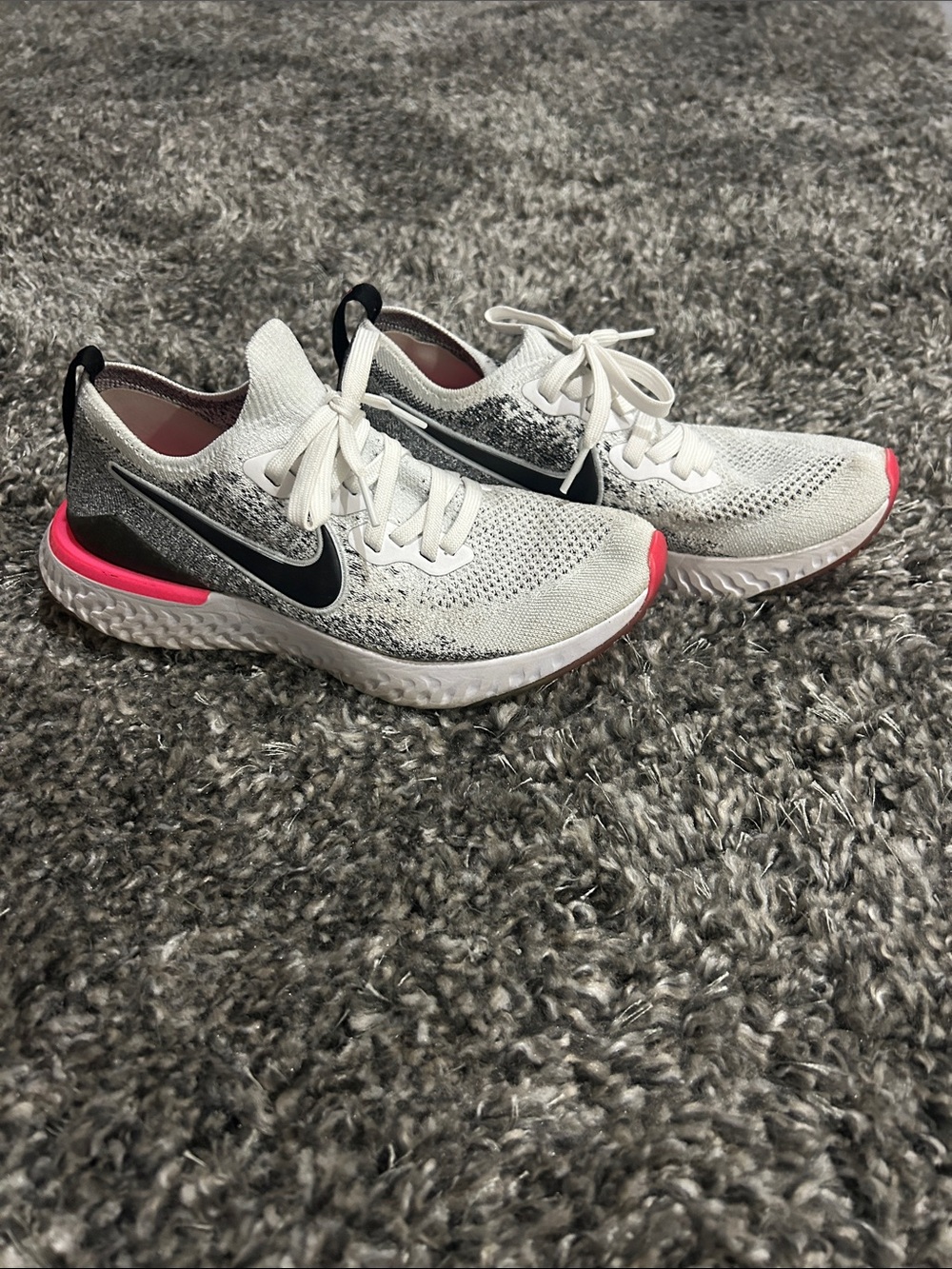 Nike Women’s White and Pink Epic React Running Sneakers with Black Swoosh